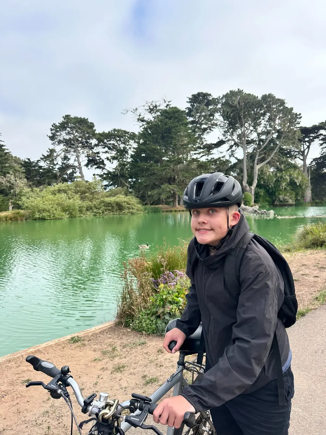 Young rider building balance and confidence during a private bike lesson in Golden Gate Park, San Francisco